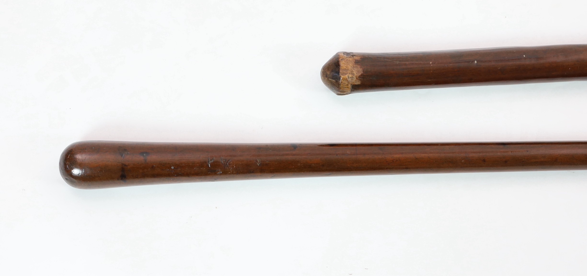 Two Tongan hardwood war clubs, 87cm and 96cm long